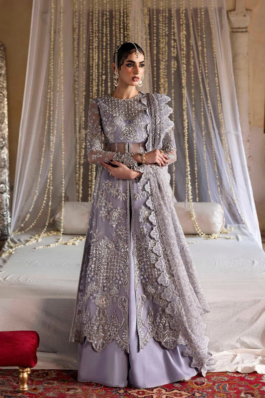 Elegant organza outfit with hand-embellished blouse, panels, sleeves, dupatta & raw silk trouser—crafted for timeless beauty and refined style.
