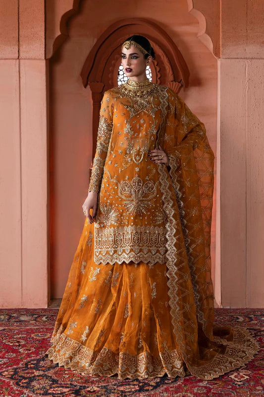 Stunning organza lehenga with hand-embellished front, sleeves, dupatta & pallu, paired with raw silk inner—perfect for a graceful, regal look.