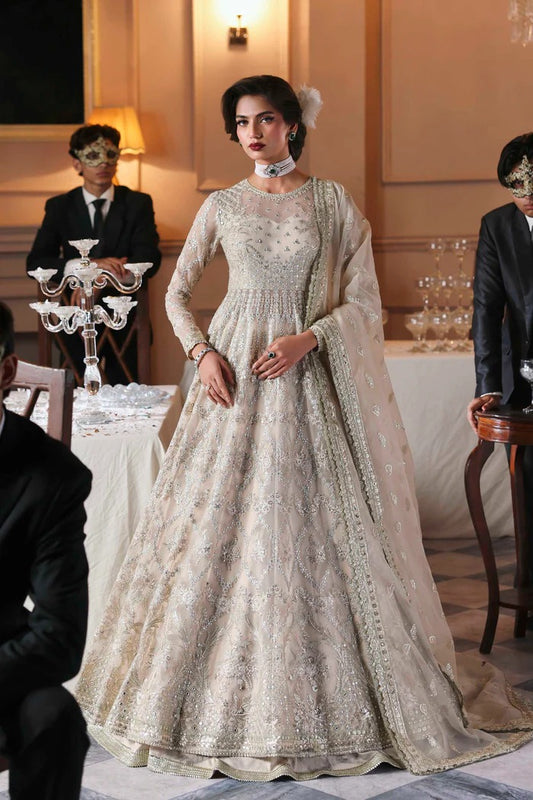Chic organza dress featuring embroidered panels, blouse, sleeves & dupatta, paired with raw silk inner—crafted for timeless elegance and style.