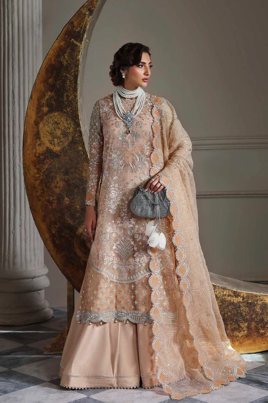 Elegant organza suit featuring embroidered front, back, sleeves, dupatta & trouser with borders, paired with silk inner—crafted for timeless grace.