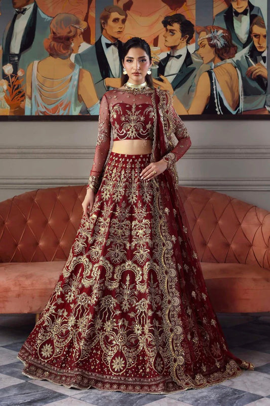 Elegant net dress featuring embroidered panels, blouse, neckline, sleeves & dupatta with borders, paired with silk inner—crafted for timeless grace.