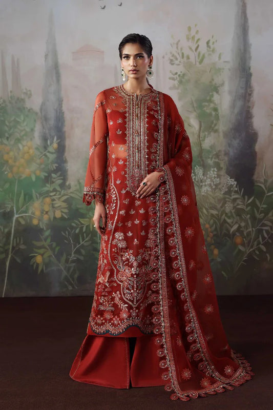 Stylish organza suit with embroidered front, neckline, back, sleeves & dupatta, paired with silk inner and trouser—crafted for elegance and grace.