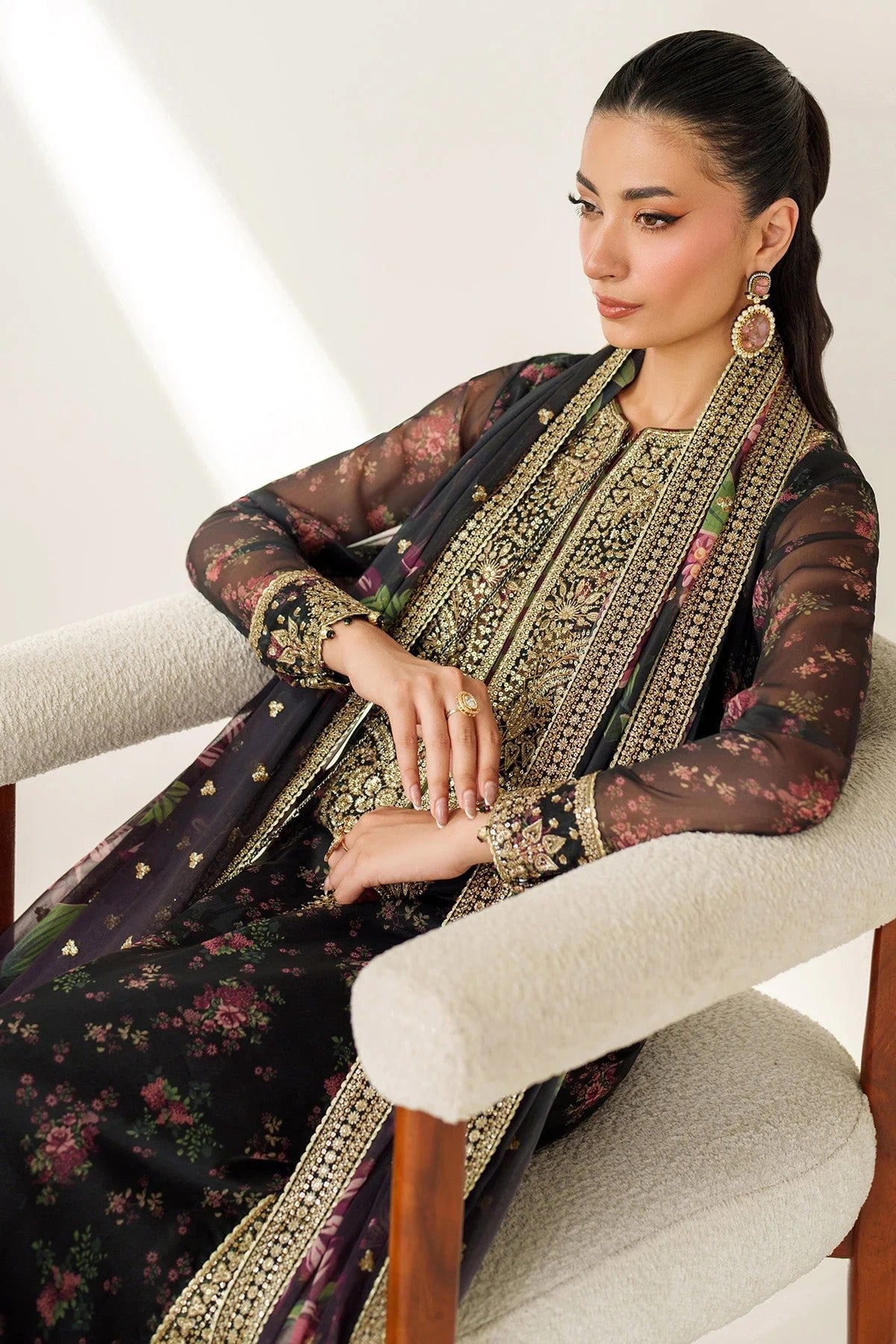 Digitally printed chiffon suit with intricate embroidery, bordered dupatta, and raw silk bottom—perfect for a graceful, formal, and timeless look.