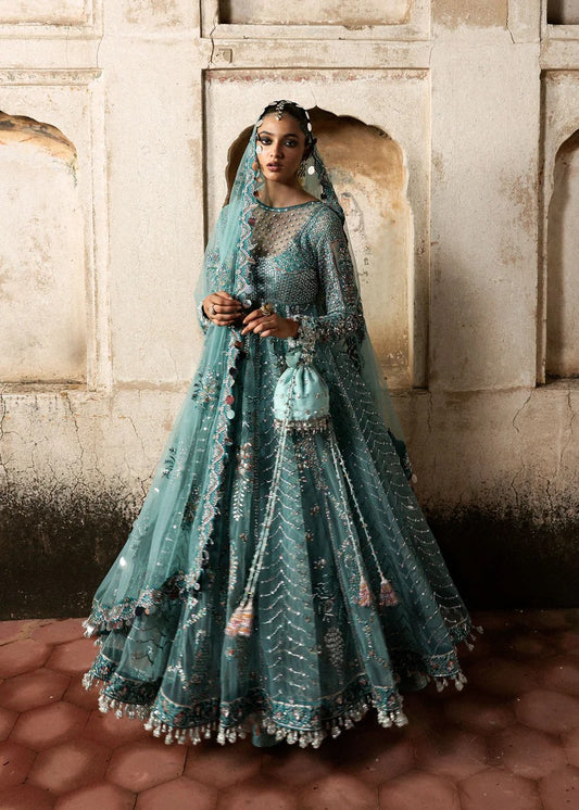 Dreamy ice blue net pishwas with sequin embroidery, silk lehnga, and chiffon dupatta. Unstitched luxury outfit that radiates elegance and grace.