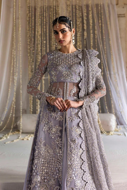 Elegant organza outfit with hand-embellished blouse, panels, sleeves, dupatta & raw silk trouser—crafted for timeless beauty and refined style.