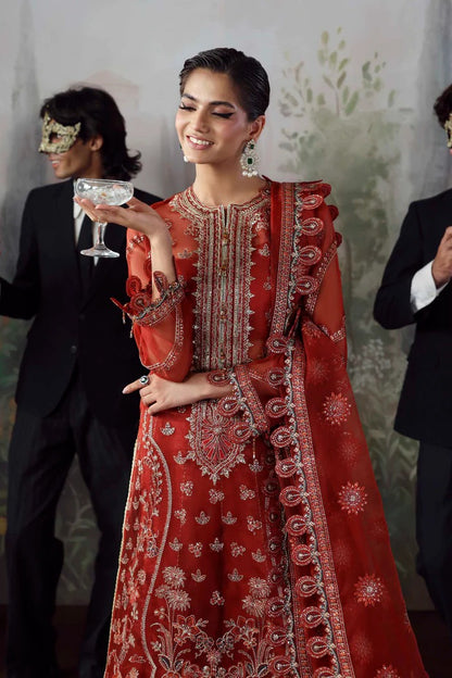 Stylish organza suit with embroidered front, neckline, back, sleeves & dupatta, paired with silk inner and trouser—crafted for elegance and grace.