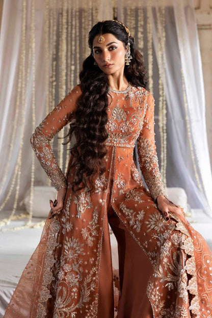 Exquisite organza suit with hand-embellished blouse, panels, sleeves, dupatta & raw silk trouser—crafted for a refined, elegant, and timeless look.