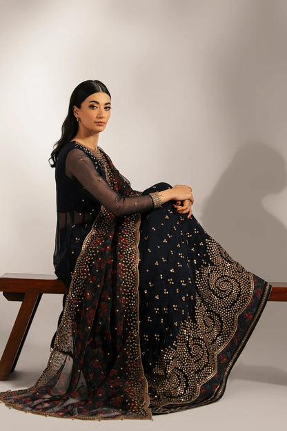 Intricately embroidered chiffon with digital print dupatta & rawsilk bottom—perfect for formal occasions. A luxurious look in every detail. Shop UC-3073 now!
