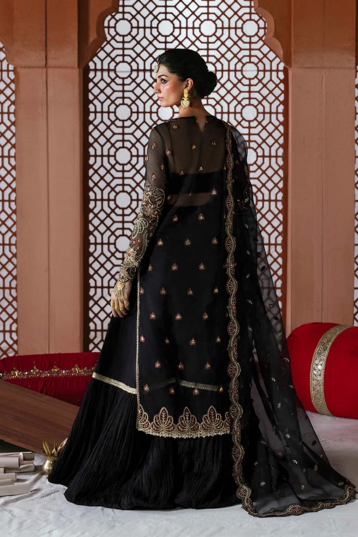 Elegant organza dress with hand-embellished front, sleeves, dupatta, raw silk trouser & inner—crafted for timeless luxury and graceful style.