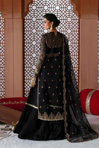 Elegant organza dress with hand-embellished front, sleeves, dupatta, raw silk trouser & inner—crafted for timeless luxury and graceful style.