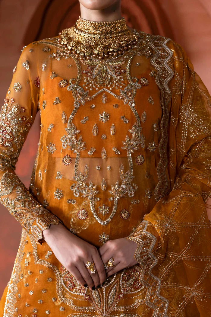 Stunning organza lehenga with hand-embellished front, sleeves, dupatta & pallu, paired with raw silk inner—perfect for a graceful, regal look.