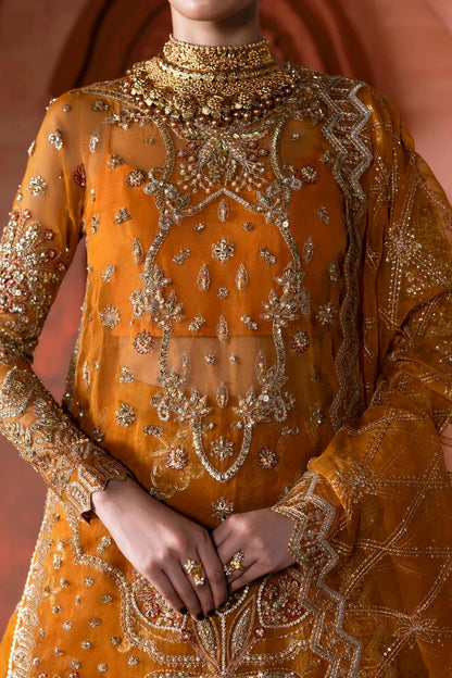 Stunning organza lehenga with hand-embellished front, sleeves, dupatta & pallu, paired with raw silk inner—perfect for a graceful, regal look.