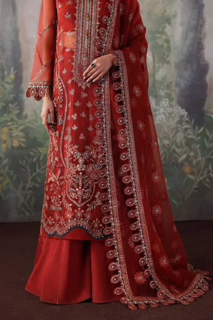 Stylish organza suit with embroidered front, neckline, back, sleeves & dupatta, paired with silk inner and trouser—crafted for elegance and grace.