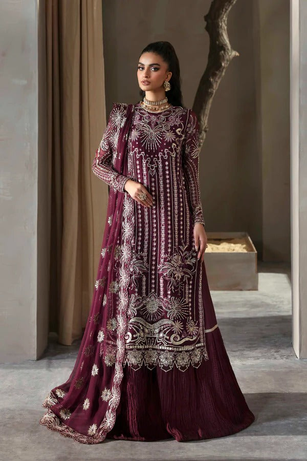 Grace your look with this chiffon embroidered dress featuring detailed borders, sleeves, and dupatta. Paired with a raw silk garara for timeless elegance.