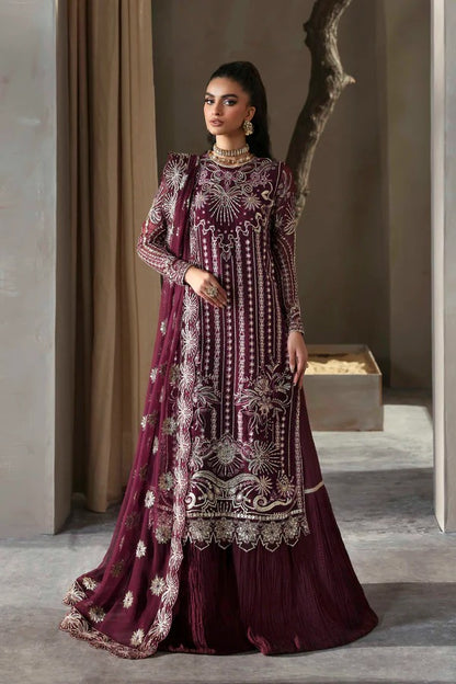 Grace your look with this chiffon embroidered dress featuring detailed borders, sleeves, and dupatta. Paired with a raw silk garara for timeless elegance.