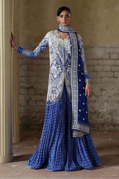 Elegant white blue printed silk suit with hand-embellished panels, embroidered dupatta,&   crushed sharara. Perfect for weddings, festive, and formal occasions.