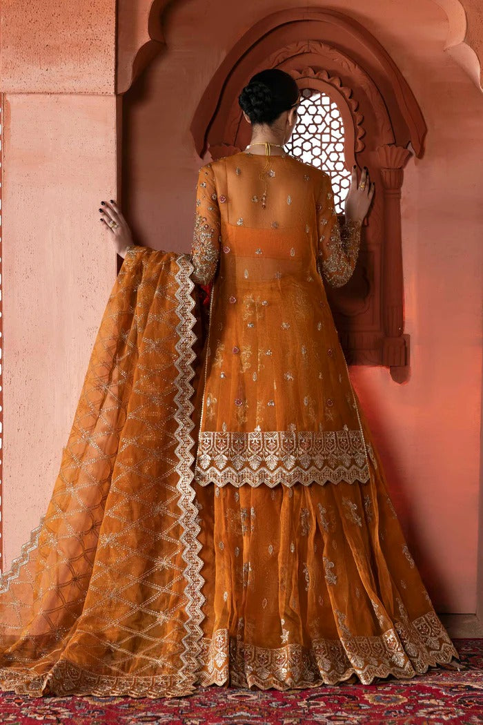 Stunning organza lehenga with hand-embellished front, sleeves, dupatta & pallu, paired with raw silk inner—perfect for a graceful, regal look.