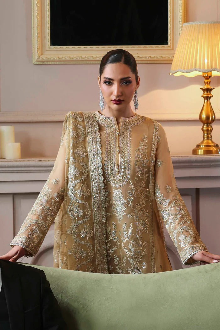 Elegant organza dress featuring embroidered panels, borders, sleeves & dupatta, paired with silk inner and trouser—crafted for timeless luxury style.
