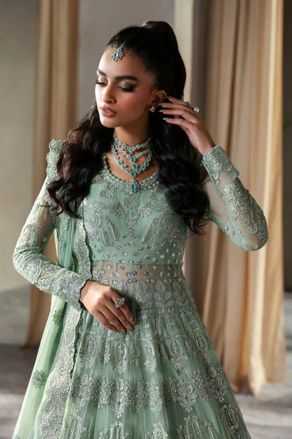 Elegant chiffon outfit featuring embroidered panels, sleeves, and dupatta with organza borders, paired with a luxurious raw silk inner for timeless grace.