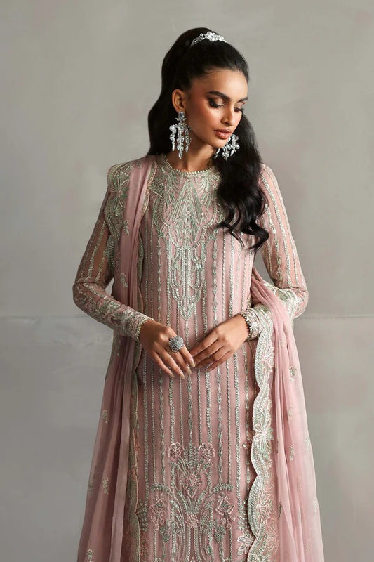 Beautiful chiffon dress with embroidered front, back, and sleeves, paired with organza borders, chiffon dupatta, and raw silk trouser for a refined look.