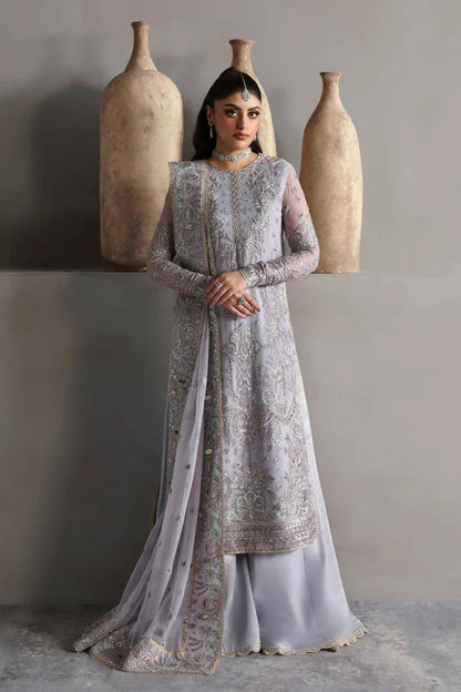 Graceful chiffon outfit with embroidered front, back, and sleeves enhanced by organza borders. Paired with a chiffon dupatta and raw silk trouser for elegance.