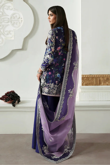 Elegant floral printed purple silk suit with embroidered panels, embellished organza dupatta, and matching silk trousers. A perfect outfit for festive & formal occasions.