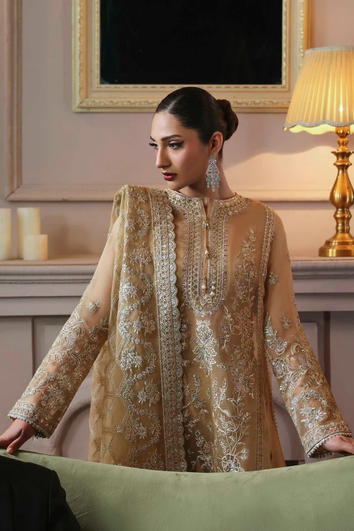 Elegant organza dress featuring embroidered panels, borders, sleeves & dupatta, paired with silk inner and trouser—crafted for timeless luxury style.