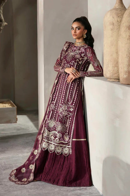 Grace your look with this chiffon embroidered dress featuring detailed borders, sleeves, and dupatta. Paired with a raw silk garara for timeless elegance.