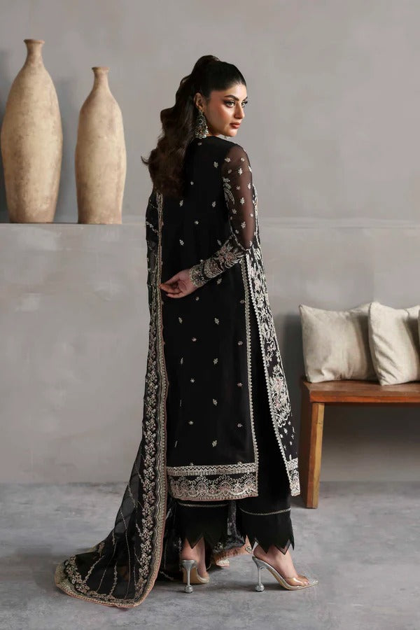 Elegant chiffon dress with embroidered front, back, and sleeves, paired with an organza dupatta and raw silk trouser — perfect for formal elegance.