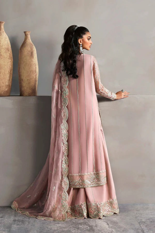Beautiful chiffon dress with embroidered front, back, and sleeves, paired with organza borders, chiffon dupatta, and raw silk trouser for a refined look.