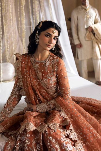 Exquisite organza suit with hand-embellished blouse, panels, sleeves, dupatta & raw silk trouser—crafted for a refined, elegant, and timeless look.