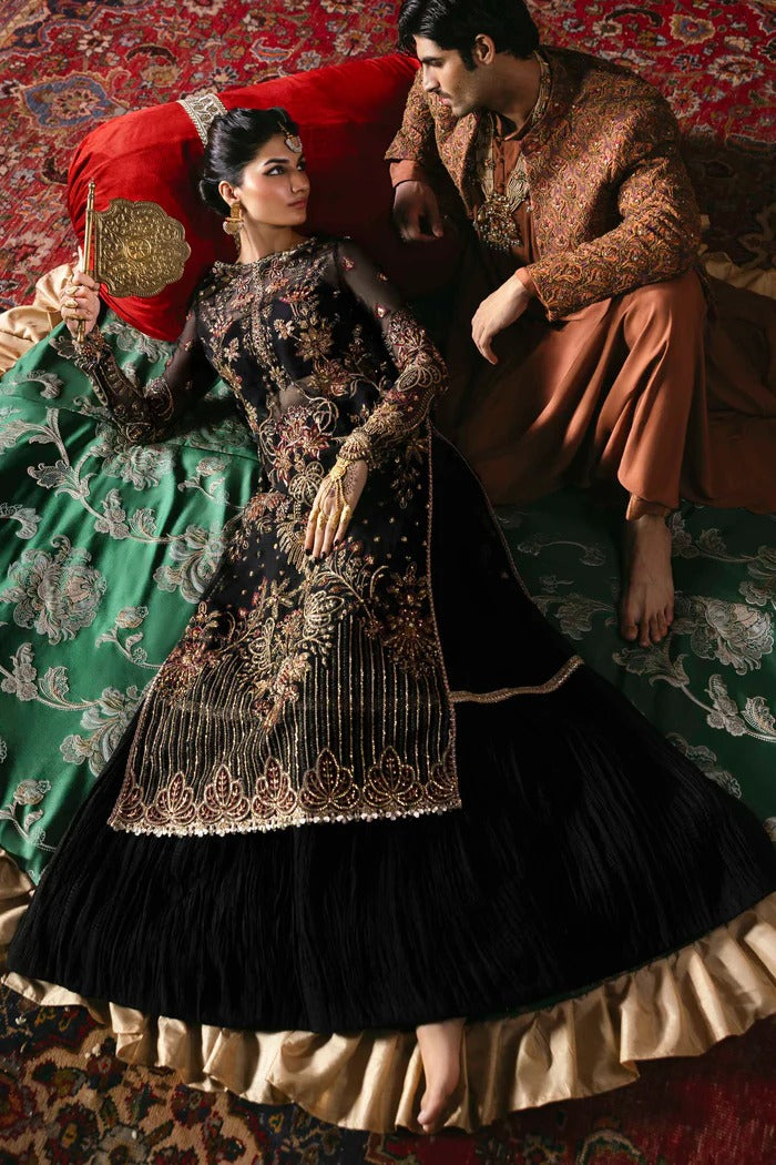 Elegant organza dress with hand-embellished front, sleeves, dupatta, raw silk trouser & inner—crafted for timeless luxury and graceful style.