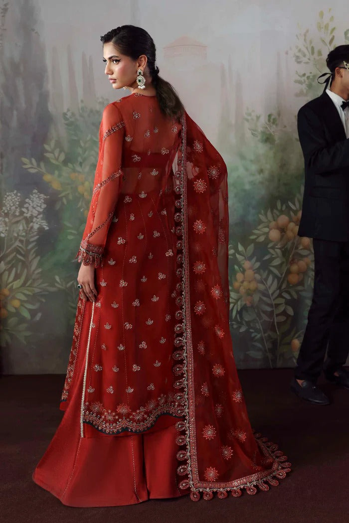 Stylish organza suit with embroidered front, neckline, back, sleeves & dupatta, paired with silk inner and trouser—crafted for elegance and grace.