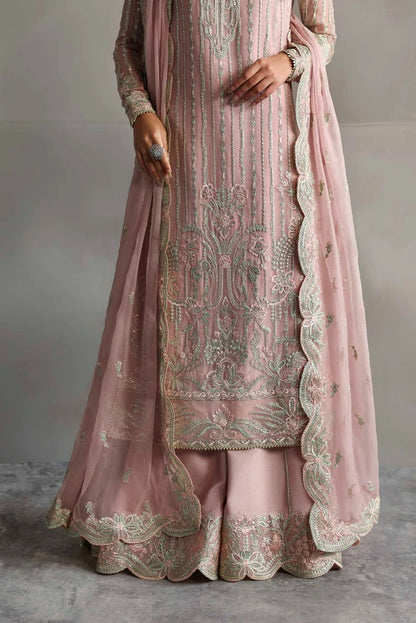 Beautiful chiffon dress with embroidered front, back, and sleeves, paired with organza borders, chiffon dupatta, and raw silk trouser for a refined look.