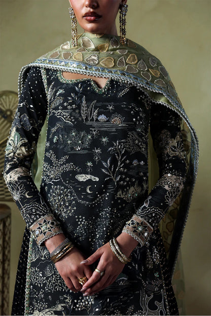 Stylish black silk suit featuring hand-embellished panels, embroidered dupatta, and chiffon crushed trousers. Perfect choice for festive and formal occasions.