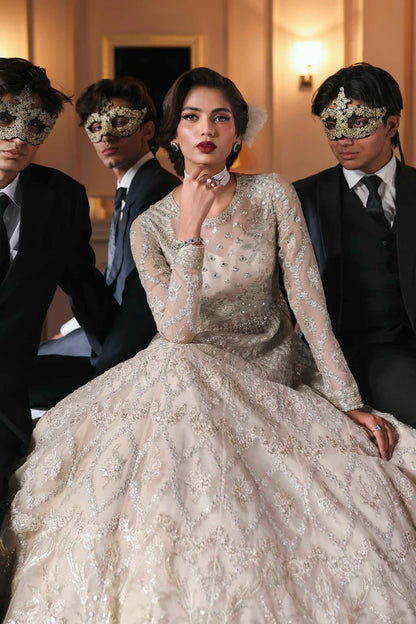 Chic organza dress featuring embroidered panels, blouse, sleeves & dupatta, paired with raw silk inner—crafted for timeless elegance and style.
