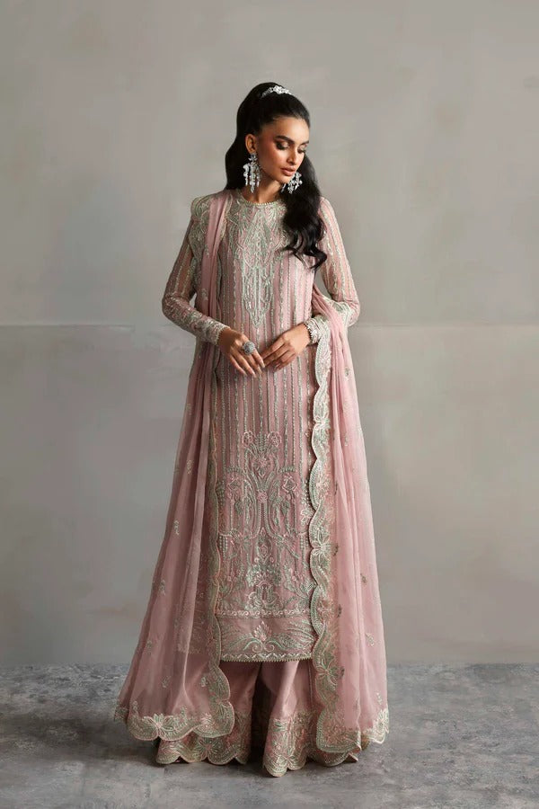 Beautiful chiffon dress with embroidered front, back, and sleeves, paired with organza borders, chiffon dupatta, and raw silk trouser for a refined look.