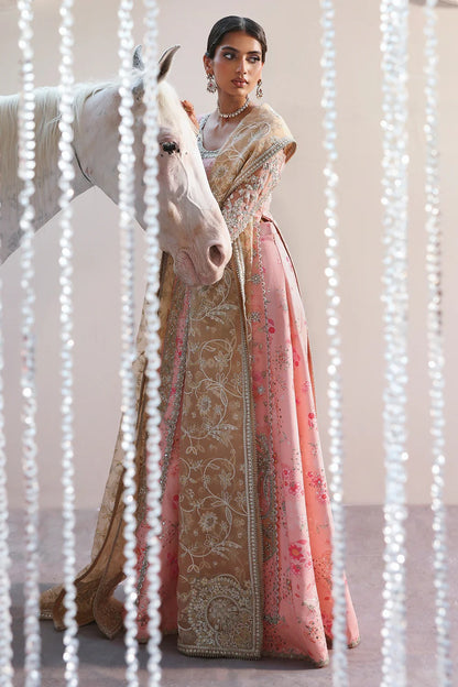 Beautiful printed pink silk suit with embroidered organza panels, embellished dupatta, and stylish sharara. Perfect for weddings, festive, and formal occasions.