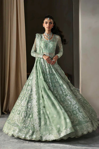 Elegant chiffon outfit featuring embroidered panels, sleeves, and dupatta with organza borders, paired with a luxurious raw silk inner for timeless grace.