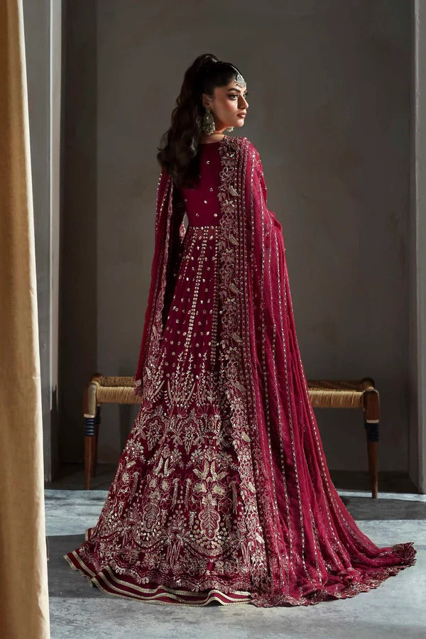 Graceful chiffon dress featuring 12" embroidered panels, elegant sleeves, and organza borders, paired with a matching dupatta and soft raw silk inner.