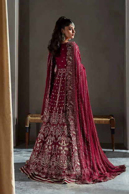 Graceful chiffon dress featuring 12" embroidered panels, elegant sleeves, and organza borders, paired with a matching dupatta and soft raw silk inner.