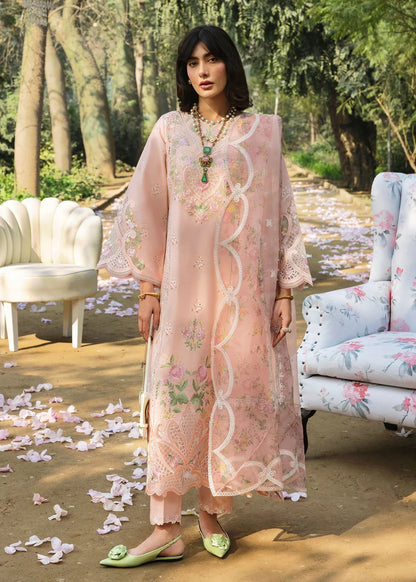 Grace your look with this peach embroidered lawn suit featuring chikan-kari panels, hand-work neckline, net dupatta, and cotton trouser.