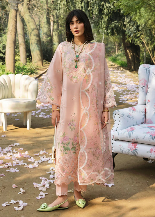 Grace your look with this peach embroidered lawn suit featuring chikan-kari panels, hand-work neckline, net dupatta, and cotton trouser.