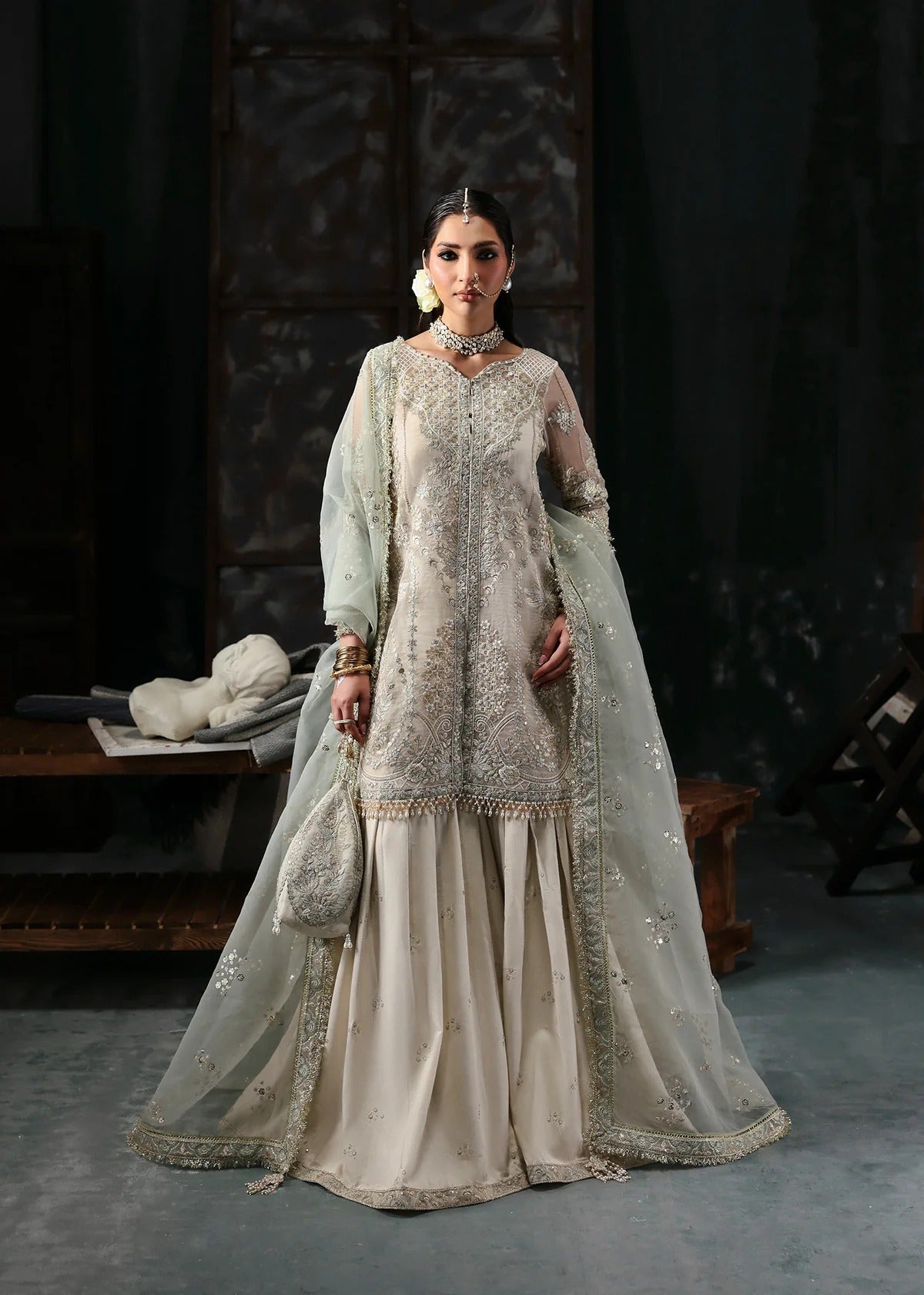 Elegant dusty white organza dress with embroidered panels, dupatta & raw silk trouser. Available stitched/unstitch with fast local & international delivery.