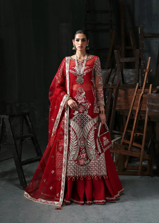Stunning red organza dress with cutwork neckline, embroidered panels, dupatta & raw silk trouser. Available stitched/unstitch with custom sizing.