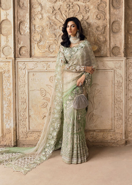 Stunning chiffon saree with gradient embroidery, diamante detailing, cutwork organza blouse with 3D flowers, and raw silk petticoat — perfect for weddings.