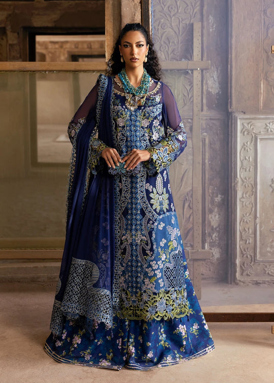 Stunning chiffon embroidered suit with hand-embellished neckline, cutwork motifs, diamante dupatta, and printed raw silk trouser for festive elegance.