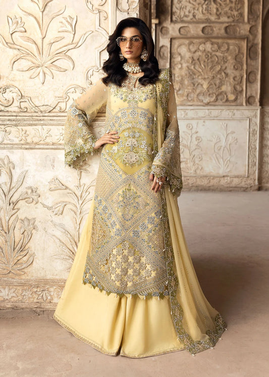 Graceful chiffon suit featuring luxury hand embellishment, cutwork organza borders, diamante & mukesh dupatta, paired with raw silk trouser.