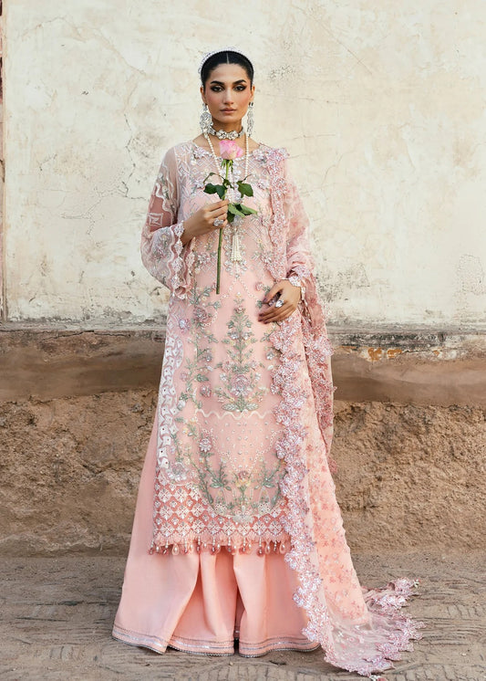 Luxury chiffon suit with 3D embellished front, organza cutwork borders, embroidered chiffon dupatta, and raw silk trouser — perfect for weddings & parties.