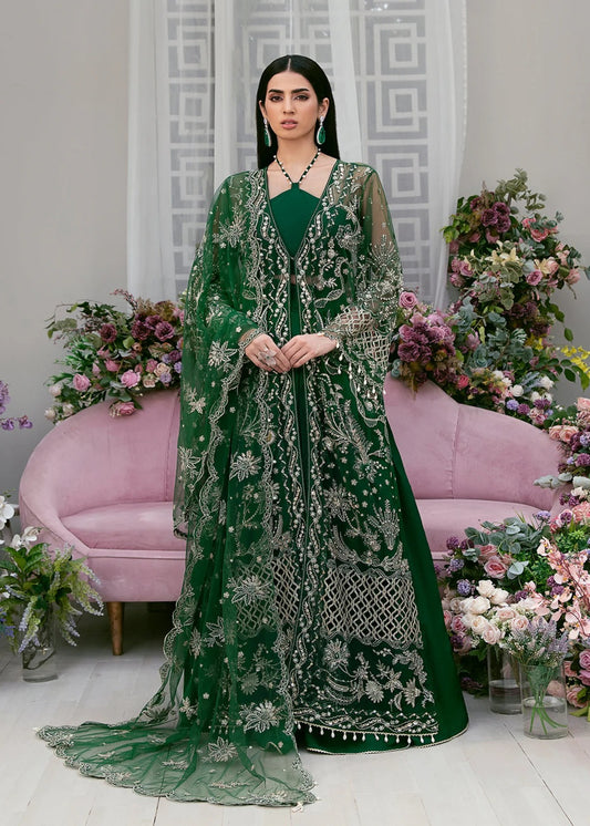Luxury poly net embroidered suit with hand-embellished panels, cutwork sleeves, organza borders, embroidered dupatta, and raw silk trouser fabric.
